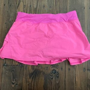 Bright pink lululemon pace setter skirt